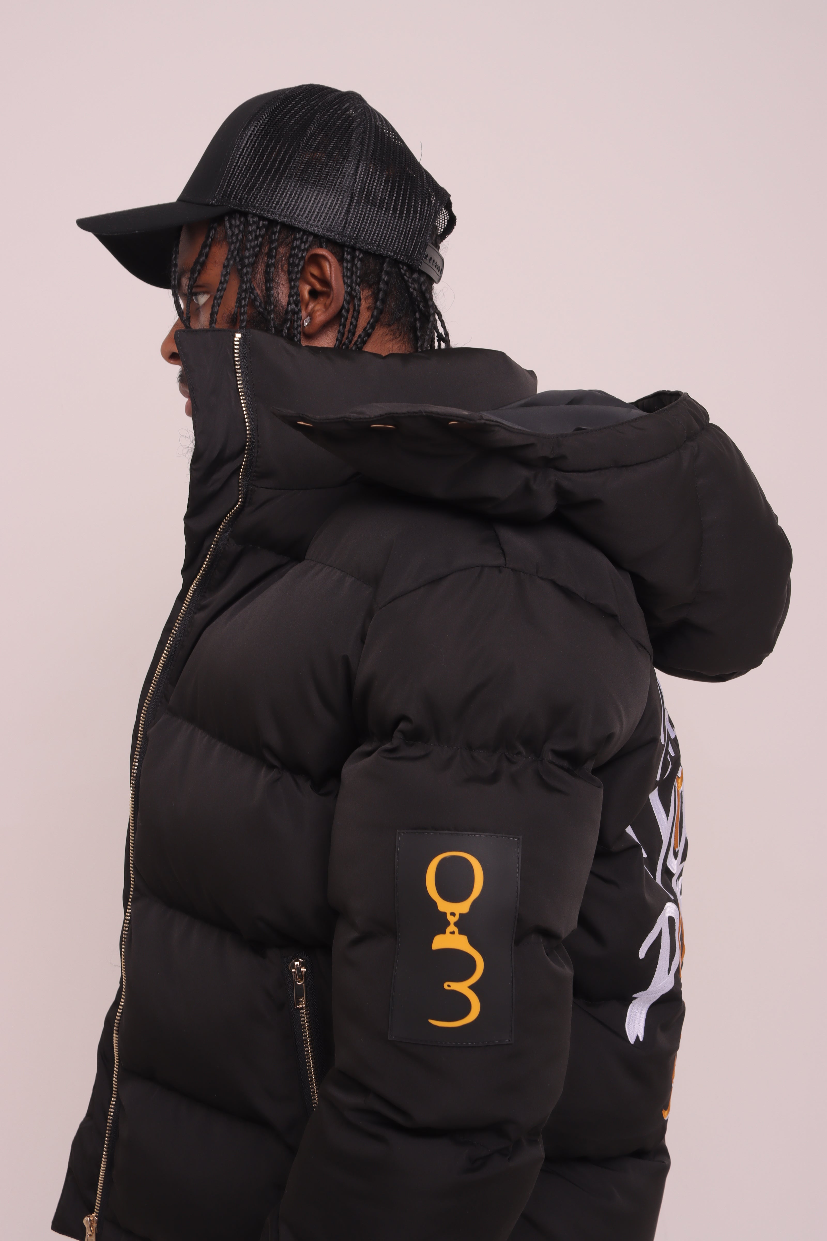 Black "Unlock Your Potential" Puffer Jacket