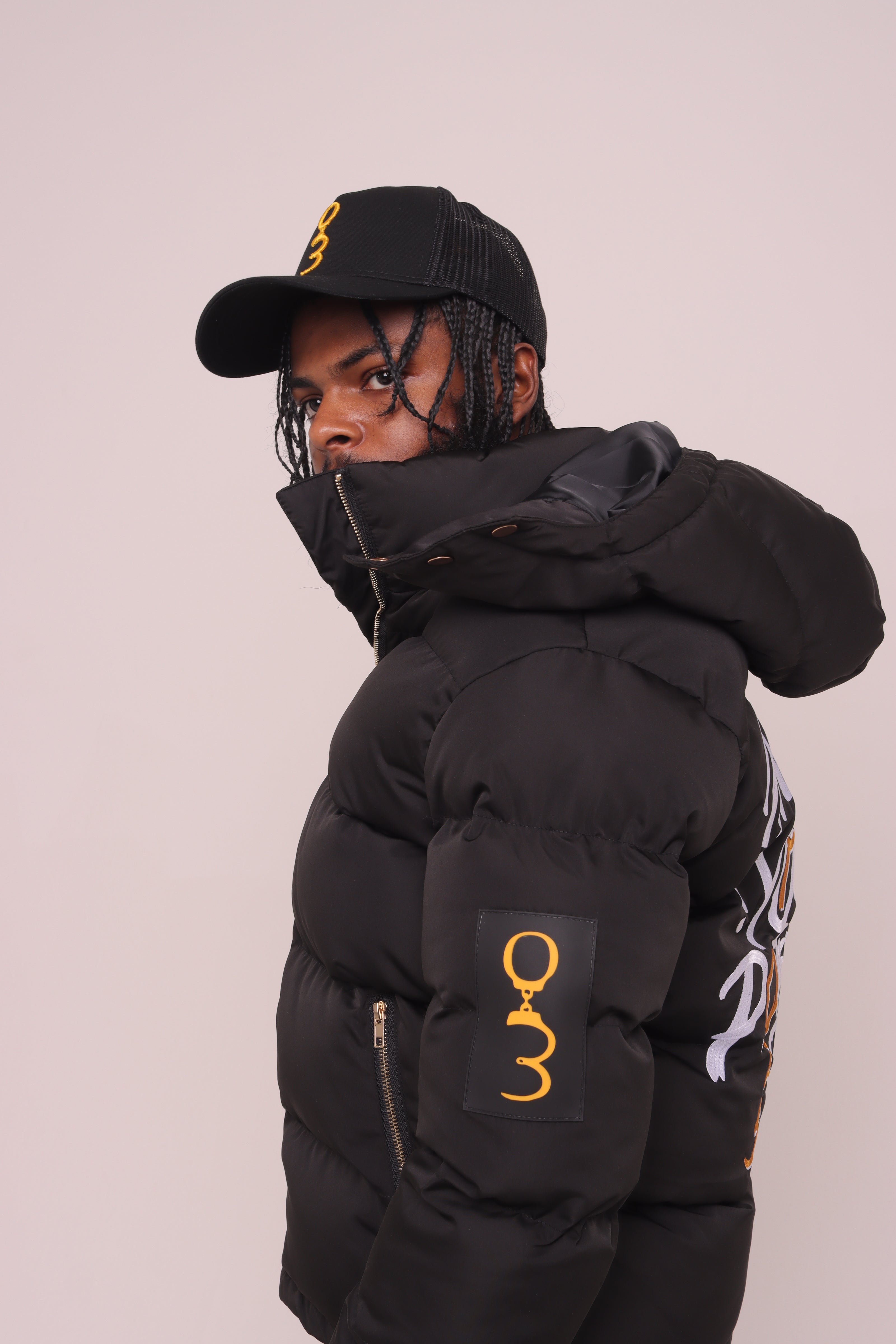 Black "Unlock Your Potential" Puffer Jacket