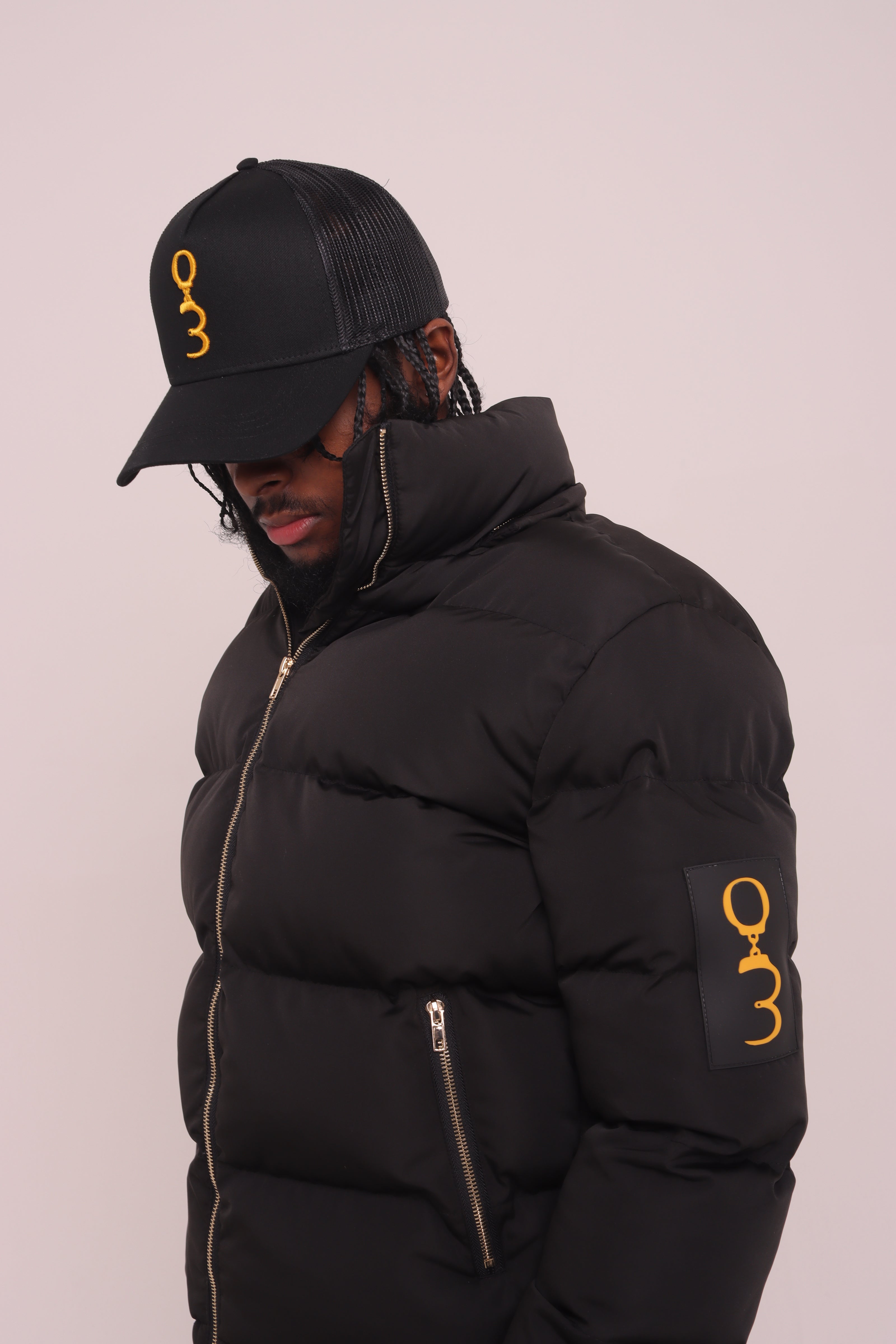 Black "Unlock Your Potential" Puffer Jacket