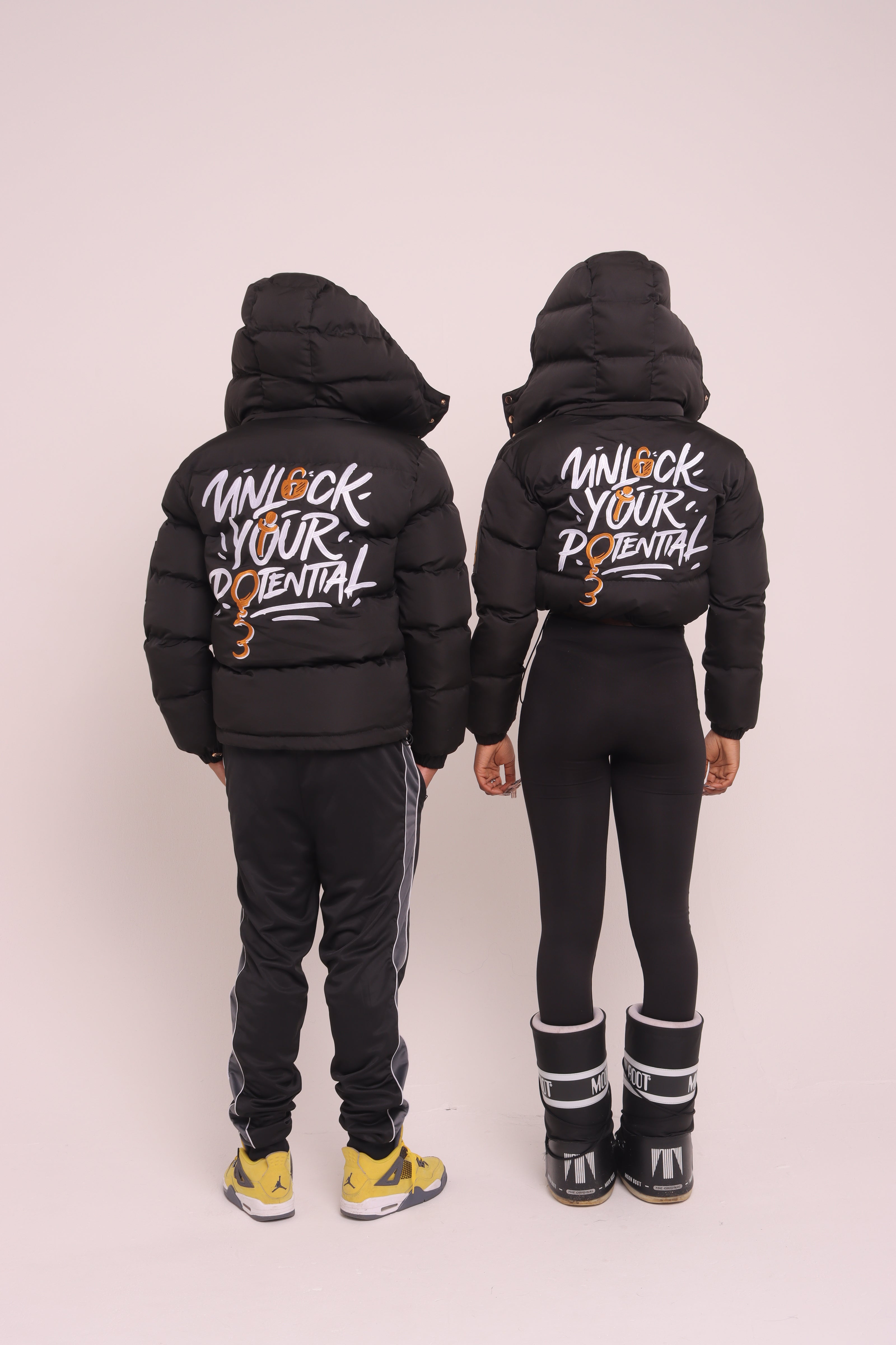 Cropped Black "Unlock Your Potential" Puffer Jacket