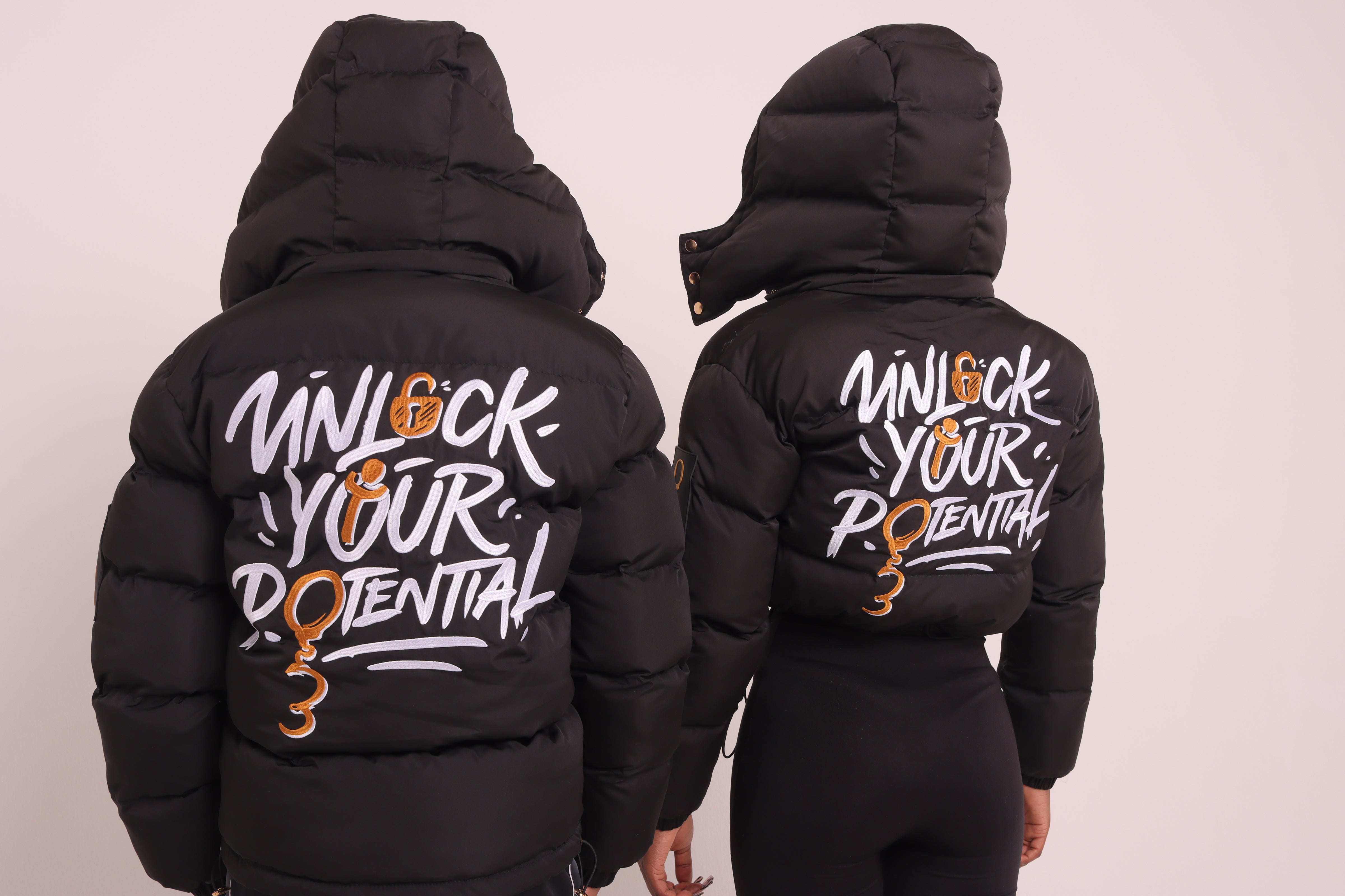 Cropped Black "Unlock Your Potential" Puffer Jacket
