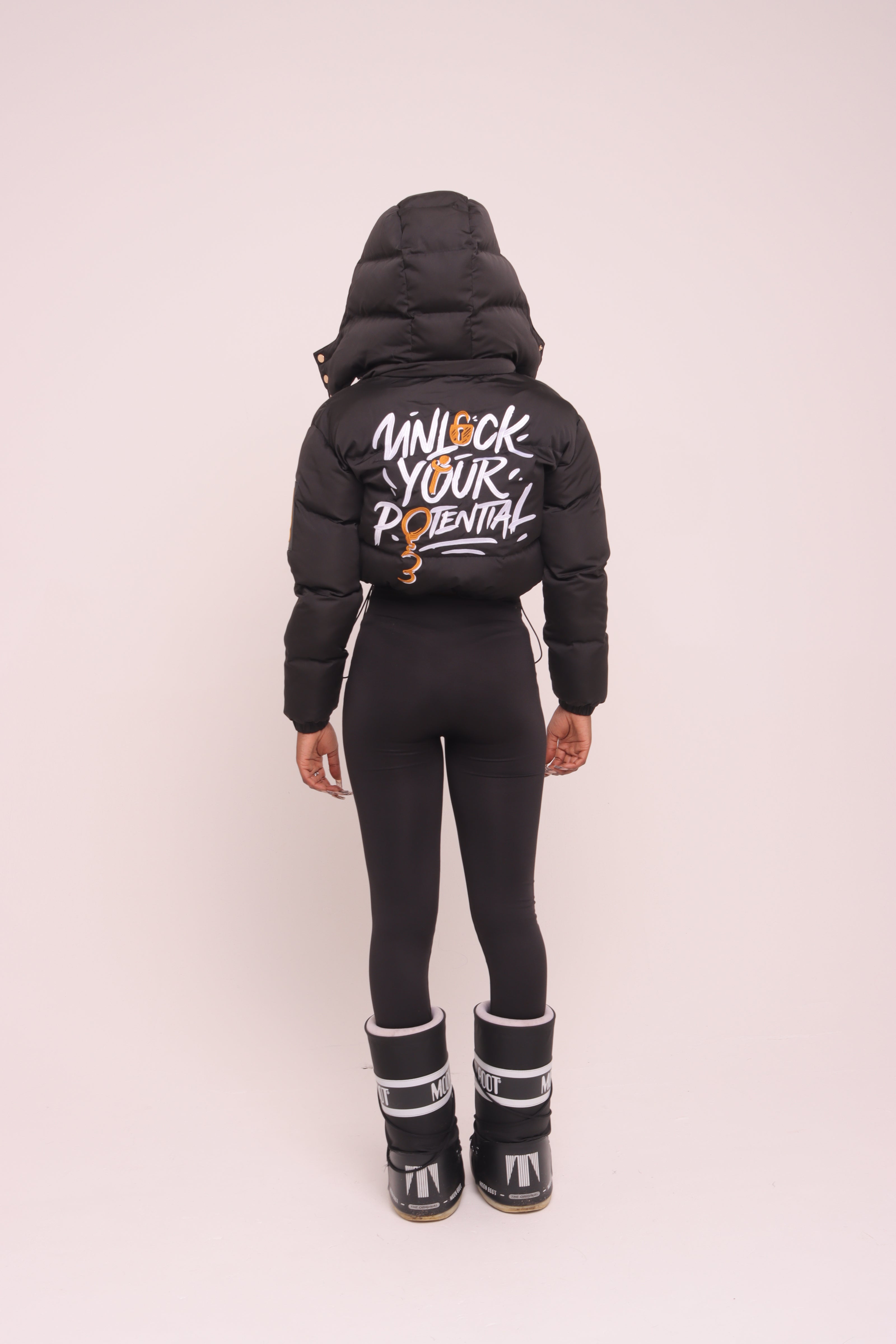 Cropped Black "Unlock Your Potential" Puffer Jacket